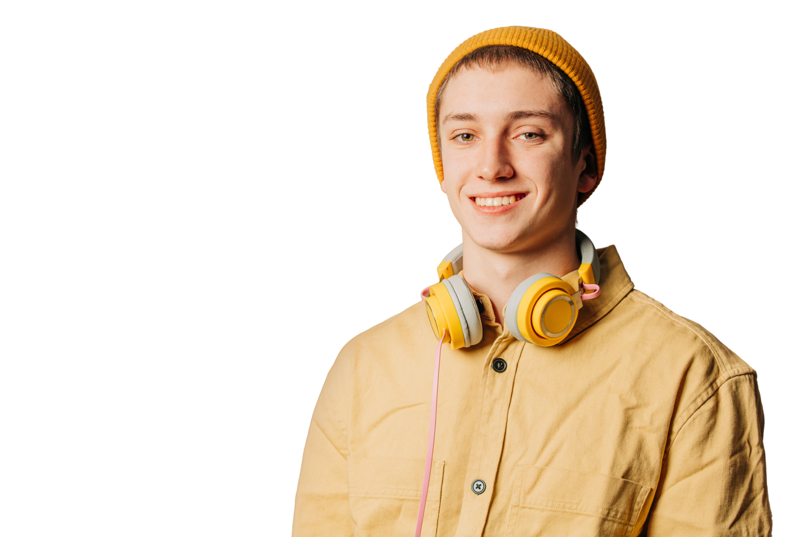 Smiling young White man with yellow headphones.